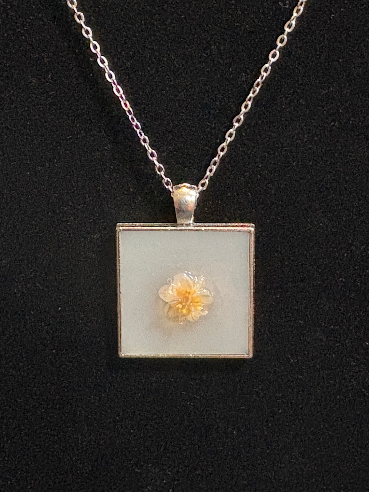 Handmade White Floral Resin Pendant Necklace – Silver-Tone